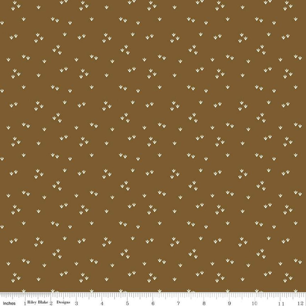 Scattered Footprints in Brown from Cretaceous by Riley Blake Designs